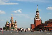 Iconic Red Square, with the Kremlin in the foreground and Saint Basil's Cathedral in the background.