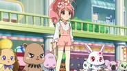 A pink koala with Jewelpet-like eyes in the crownd.