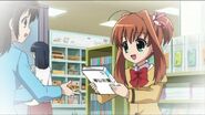 Akari buying a comic.