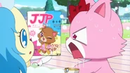 A milk-chocolate brown cat Jewelpet on the cover of a magazine.