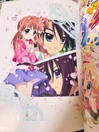 Picture of Akari, Yuuma and Alma artwork in a bonus artbook from one of the DVD box.