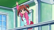 Akari's waving.