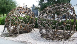 The two bone cages used in one of the early scenes of the film. The cages were on display on the  at  until it shut down in 2014.