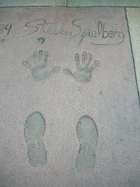 Spielberg's shoeprints and handprints in front of the 