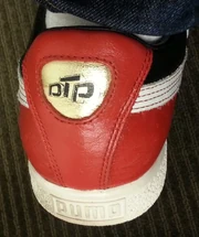 Heel window of the Clyde x Luda  sneaker showing the  logo