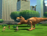 A large dinosaur is chasing Britney, Ike, and Bolbi.