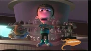 After having just revealed his mental abilities, Sheen rises up off the chair and announces his plans for world domination.