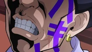 Kanji from Echoes' punch on Tamami's cheek.