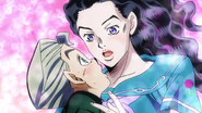 Yukako embracing Koichi after he stumbles into her.