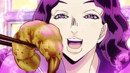 Yukako feeds Koichi a shrimp.webp (8 kB) Yukako alimentando carinhosamente um camarão para Koichi.