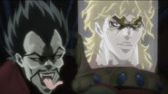 Dio's severed head held by Wang Chan