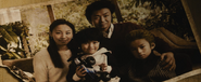 A Young Nijimuras' Father With His Wife And Kids.