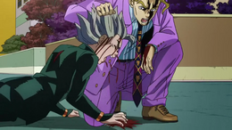 Kira pummeling Koichi