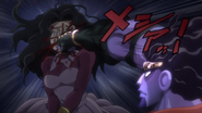 Star Platinum punches Nukesaku in his female form