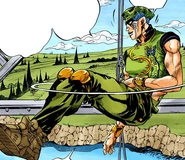 Hanging from a cable.