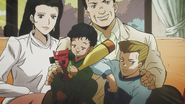 Okuyasu as a child, along with his family.