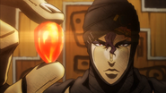 Kars holding an imperfect Red Stone of Aja.