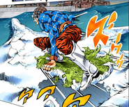 Mista riding across ice on a sled of frozen tundra grass