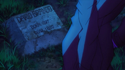 Dario's tombstone with Dio about to spit on it.