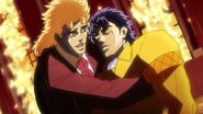 Speedwagon cries as he holds an unconscious Jonathan