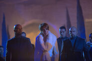 Gianna arriving at the coronation with her bodyguards being Cassian among them