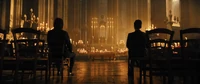John and Caine inside a church.