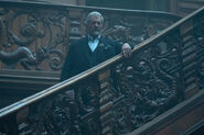 Cormac on The Continental's stairs.