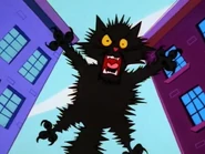 The cat attacking Johnny.