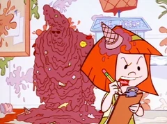 Johnny covered in food as Suzy grades his progress.