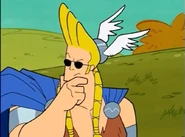 Johnny thinking about what to use his powers for.