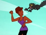 The cat attacking Dionne Warwick.