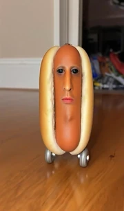 Hotdog roller rolling on hardwood floor