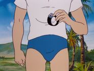 Jonny takes off his watch before swimming