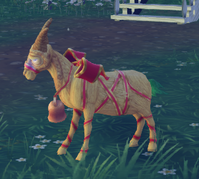 Baby Yule Goat Side View.png