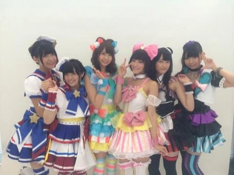Cosplaying as their respective PriPara characters (as idols)