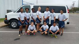 AFJROTC cadets wearing the Air Force Physical Training Uniform (AFPTU) T-shirt, and shorts.