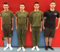 Marine Corps Junior ROTC cadets wearing the USMC PT uniform.