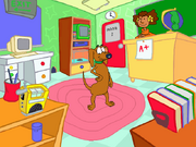 Frankie the dog standing in the middle of a colorful 1st Grade classroom