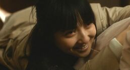 Yui's evil smile.