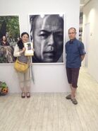 Saisho with actor and photographer Yoji Tanaka (Toyama) in July 2014.[3]