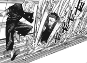 Yuji avoids Higuruma's barrage.