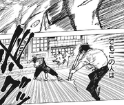 Yuta hits Yuji with the pommel of his katana