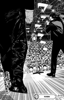 Kenjaku and Fumihiko walk on stage
