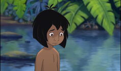 Mowgli getting punished by Ranjan's father for attemping to take the children to the jungle and Mowgli has to go to his room without dinner.