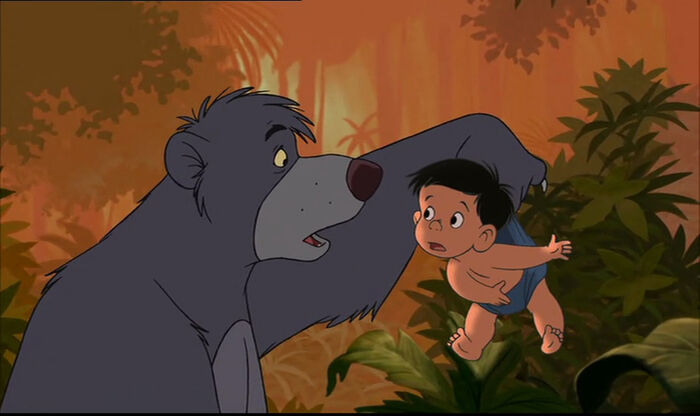 Ranjan is telling Baloo the bear Mowgli and Shanti are in danger