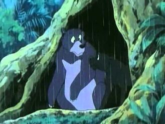 Baloo and Bagheera following Mowgli