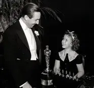Disney and a young Shirley Temple Black