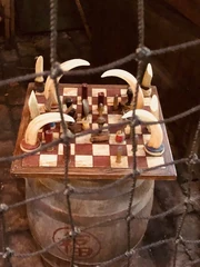 Elephant tusks used as chess-pieces by skippers'"`UNIQ--ref-00000001-QINU`"'