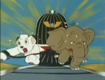 Bizo and Rune running away from a large train.