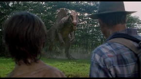 Le Spinosaurus près de l'Observatoire de la Volière regardant ses proies